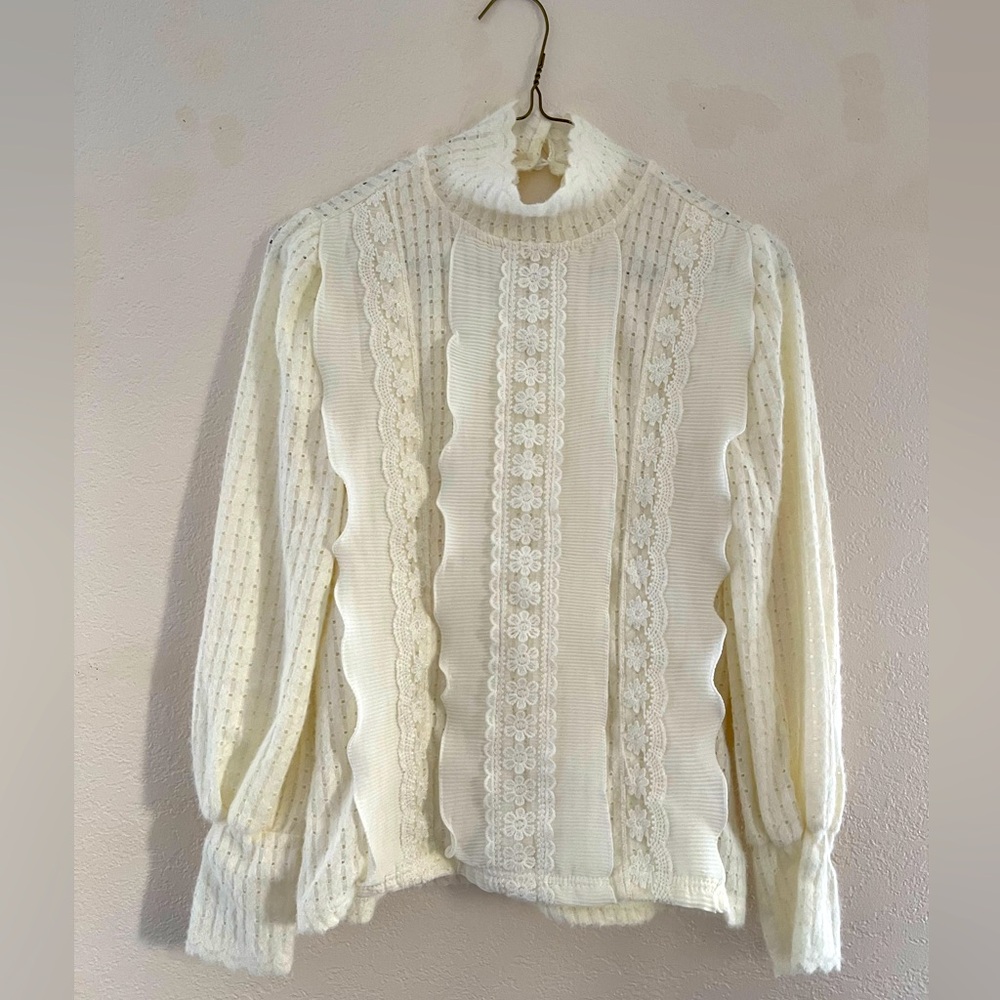Frill long sleeved ivory turtleneck shirt blouse